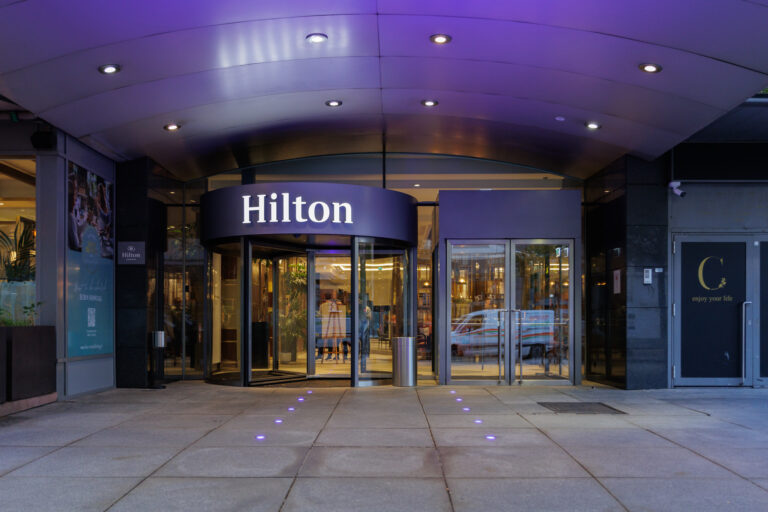 Exterior view of Hilton Vienna Park showing hotel facade and main entrance