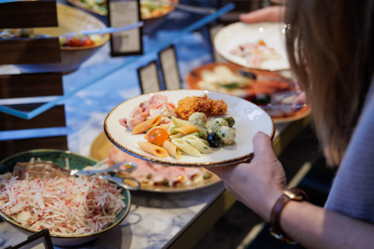 Catering and buffet arrangement at Hilton Vienna Plaza during corporate event